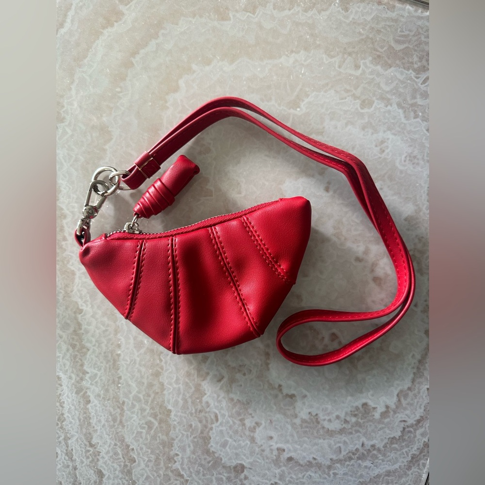 Red faux leather mini crossbody bag with silver hardware